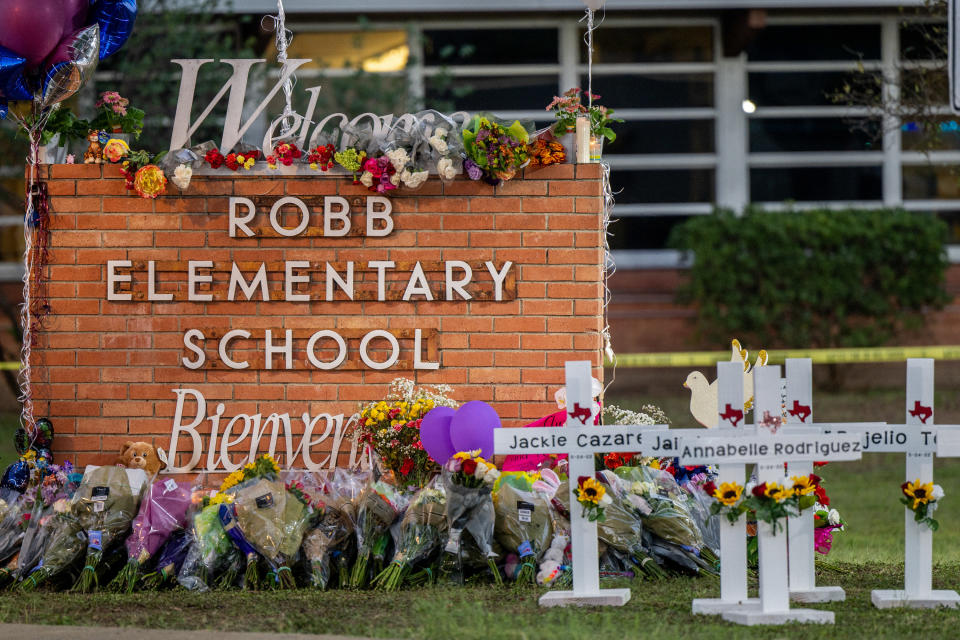 A memorial in front of Robb Elementary School in Uvalde for the students and teachers killed in the mass shooting