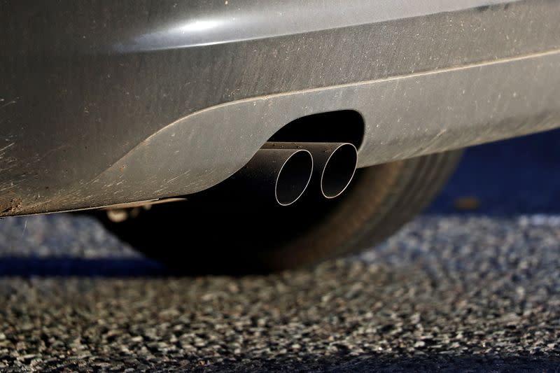 FILE PHOTO: An exhaust pipe is seen as a vehicle sits in traffic near the Blackwall Tunnel in London