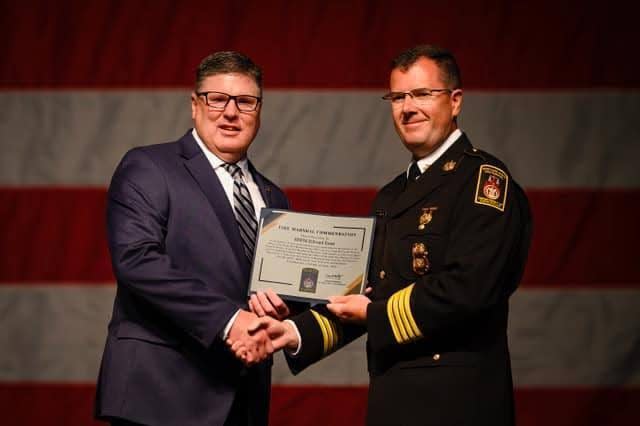 Pictured from left Master DSFM Ed Ersnt is presented his awards by Chief Deputy and Acting State Fire Marshal Jason Mowbray