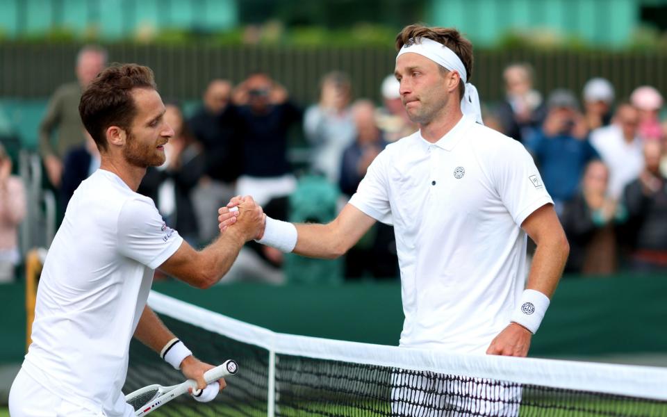 Liam Broady shakes hands with Constant Lestienne -  Jodie Burrage's big concern after first Wimbledon win? Finding a dog walker