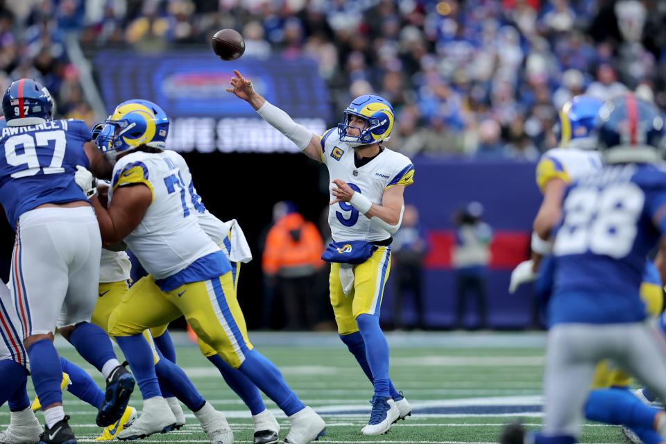Los Angeles Rams quarterback Matthew Stafford (9) throws a pass against the New York Giants during the first quarter at MetLife Stadium.