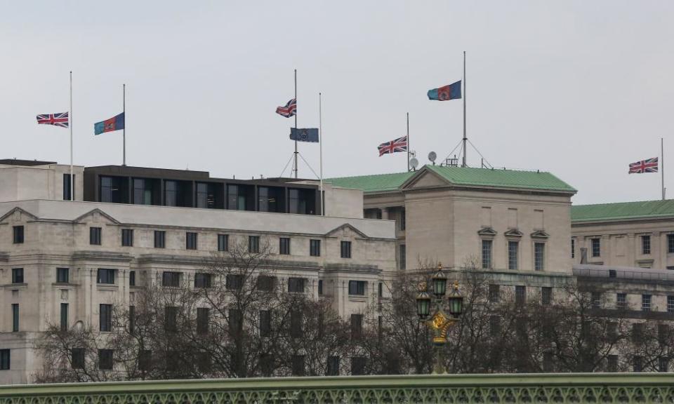 The MI5 building in London with union jack flying at half mast. 