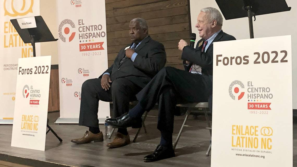 The candidates for Wake County sheriff, Democrat Willie Rowe, left, and Republican Donnie Harrison, right, participate in a Spanish-language forum in Raleigh held by El Centro Hispano on Wednesday, Sept. 7, 2022.