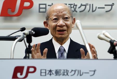 Taizo Nishimuro, president of Japan Post Holdings Co., speaks during a news conference at its headquarters in Tokyo February 18, 2015. REUTERS/Yuya Shino