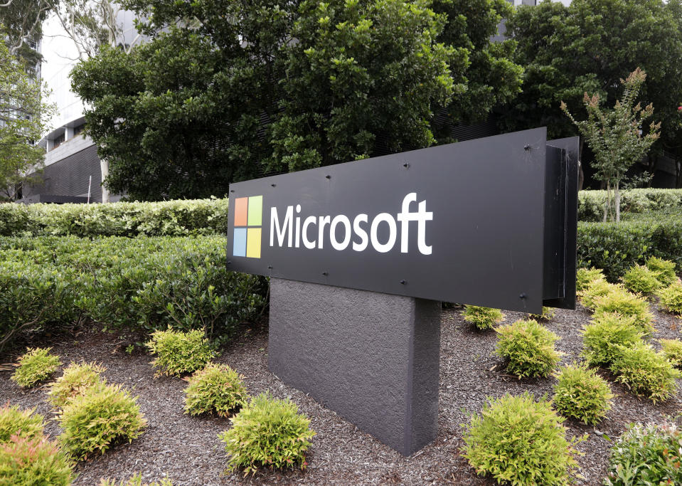 The Microsoft company logo is displayed at their offices in Sydney, Wednesday, Feb. 3, 2021. Microsoft says it supports Australia's plans to make the biggest digital platforms pay for news and would help small businesses transfer their advertising to Bing if Google quits the country. (AP Photo/Rick Rycroft)