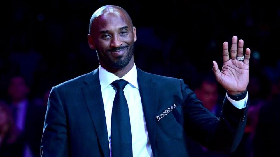 Kobe Bryant smiles at halftime as both his #8 and #24 Los Angeles Lakers jerseys are retired at Staples Center on December 18, 2017 in Los Angeles. (Photo by Harry How/Getty Images)