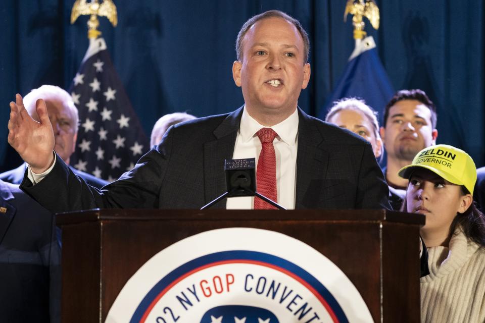 FILE - U.S. Rep. Lee Zeldin speaks to delegates and assembled party officials at the 2022 NYGOP Convention on March 1, 2022, in Garden City, N.Y. U.S. Rep. Lee Zeldin, the Republican candidate for New York governor, was attacked on Thursday, July 21, 2022 by man with knife at an upstate event but was uninjured, his campaign says.(AP Photo/John Minchillo, File)