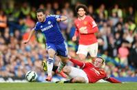 Football - Chelsea v Manchester United - Barclays Premier League - Stamford Bridge - 18/4/15 Chelsea's Eden Hazard in action with Manchester United's Wayne Rooney Action Images via Reuters / Tony O'Brien Livepic