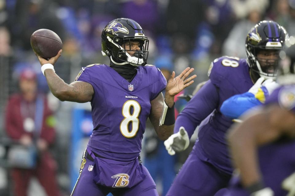 Baltimore Ravens quarterback Lamar Jackson sets to throw.