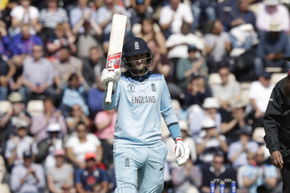 England's Joe Root celebrates reaching 50 runs during the Cricket World Cup match between England and West Indies at the Hampshire Bowl in Southampton, England, Friday, June 14, 2019. (AP Photo/Matt Dunham)