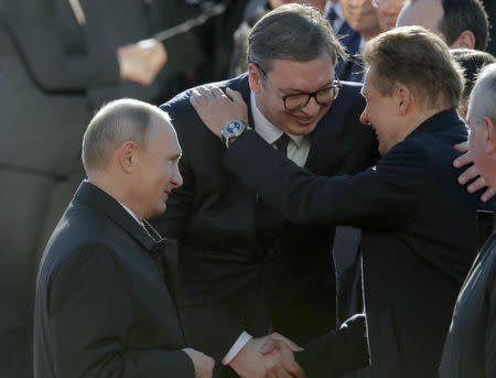 Russian President Vladimir Putin intruduces Serbian President Aleksandar Vucic to President and CEO of Gazprom company Alexei Miller (R) during the official welcome ceremony in Belgrade, Serbia January 17, 2019. Maxim Shipenkov/Pool via REUTERS