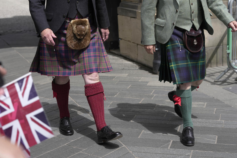 Guests arrive for a National Service of Thanksgiving and Dedication to the coronation of Britain's King Charles III and Queen Camilla, at St Giles' Cathedral in Edinburgh, Scotland, Wednesday, July 5, 2023. Two months after the lavish coronation of King Charles III at Westminster Abbey in London, Scotland is set to host its own event to mark the new monarch's accession to the throne.(AP Photo/Kin Cheung)