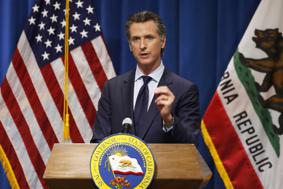 California Gov. Gavin Newsom discusses his revised 2020-2021 state budget during a news conference in Sacramento, Calif., Thursday, May 14, 2020. California Democratic Gov. Gavin Newsom presented a revised $203 billion budget proposal to state lawmakers Thursday, reflecting an economy and tax revenues hobbled by the coronavirus pandemic. (AP Photo/Rich Pedroncelli, Pool)