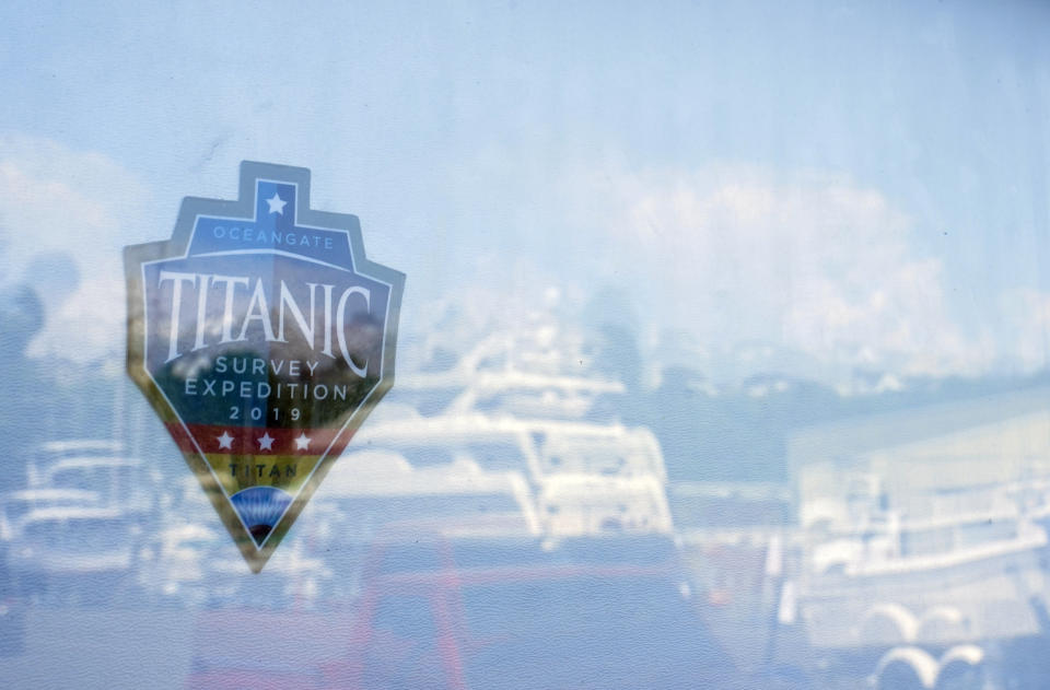 A 2019 Titanic survey expedition sticker is seen on the garage door at the OceanGate offices Thursday, June 22, 2023, in Everett, Wash. The U.S. Coast Guard said Thursday that the missing submersible Titan imploded near the Titanic shipwreck site, killing everyone on board. (AP Photo/Lindsey Wasson)