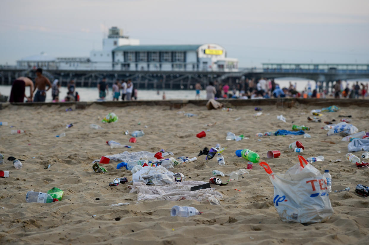 BOURNEMOUTH, ENGLAND - JUNE 25: Rubbish litters the beach after many visitors leave on June 25, 2020 in Bournemouth, United Kingdom. A major incident was declared by the local council as thousands flocked to Bournemouth and the Dorset coast.  The UK is experiencing a summer heatwave, with temperatures in many parts of the country expected to rise above 30C and weather warnings in place for thunderstorms at the end of the week. (Photo by Finnbarr Webster/Getty Images)