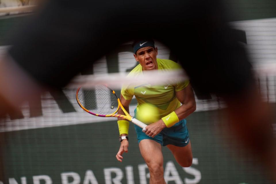 Rafael Nadal through the legs, sorry, lens (Christophe Ena/AP) (AP)