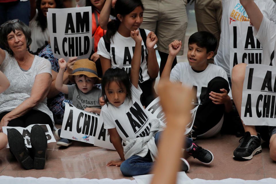 Children and parents participate in a protest in Washington against President Donald Trump's policy that separated immigrant children from their parents. (Photo: Reuters/Carlos Barria)