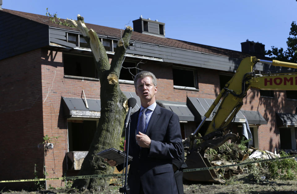 Shaun Donovan, United States Department of Housing and Urban Development Secretary, speaks during the first stage of demolishing the Frederick Douglass Homes in Detroit, Wednesday, Sept. 4, 2013. The graffiti-covered complex comprising several city blocks is better known as the Brewster projects. A $6.5 million emergency federal grant covers the initial phase of demolition and cleanup, and officials say the city will be eligible for more money when that’s completed. The federal money comes at a crucial time for the city, which is overseen by a state-appointed emergency manager and in July became the nation’s largest city to file for bankruptcy. (AP Photo/Paul Sancya)