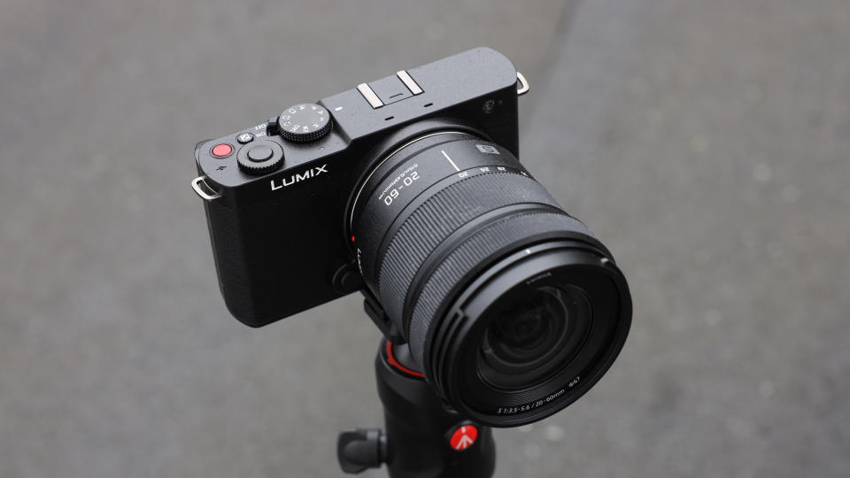 Panasonic Lumix S9 camera on a tripod outside above a grey shingle floor