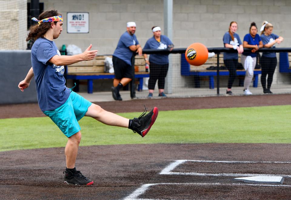 The Chicken Kickers' Donovan Antinarella of Leominster really connects with the ball during the match against Kicking Assets during the Kickin' It - Kickball Tournament with Mission Win at the New England Baseball Complex in Northborough on Aug. 17.