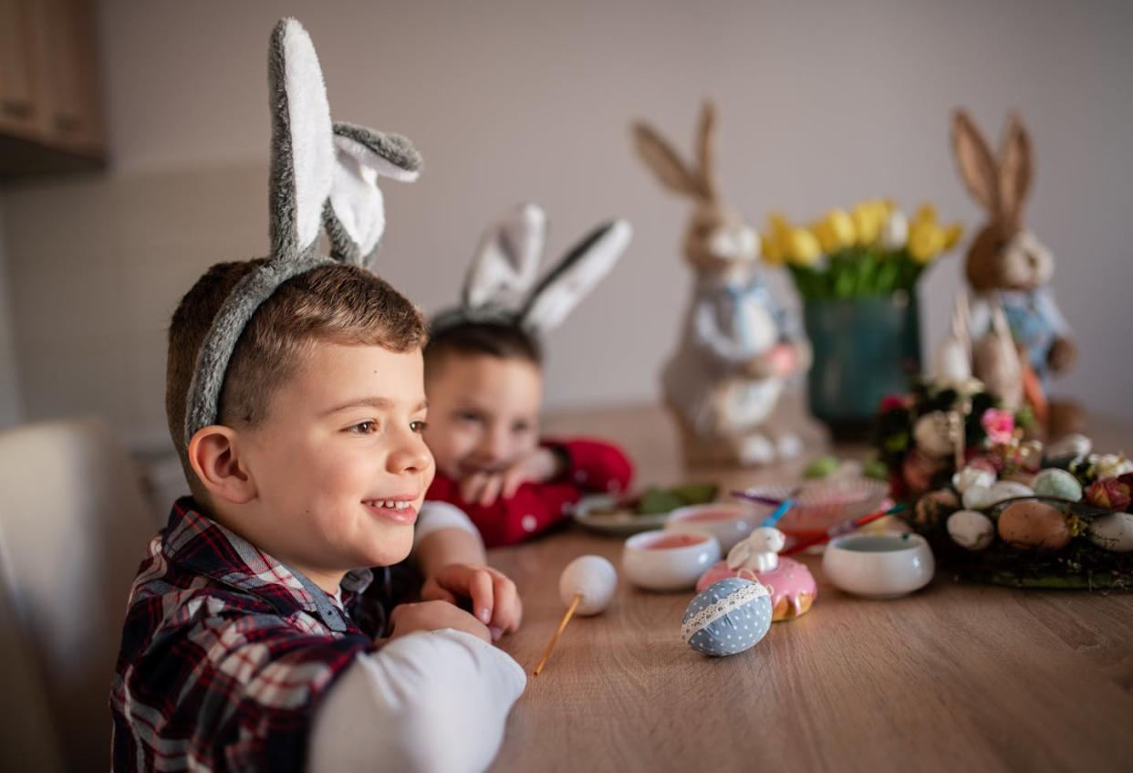 Children celebrating Easter, with their Easter Bunnies and Easter eggs. <a href="https://www.gettyimages.com/detail/photo/two-young-boys-wearing-easter-bunny-ears-royalty-free-image/1388063471?adppopup=true" rel="nofollow noopener" target="_blank" data-ylk="slk:Sanja Radin/Collection E+ via Getty Images;elm:context_link;itc:0;sec:content-canvas" class="link ">Sanja Radin/Collection E+ via Getty Images</a>