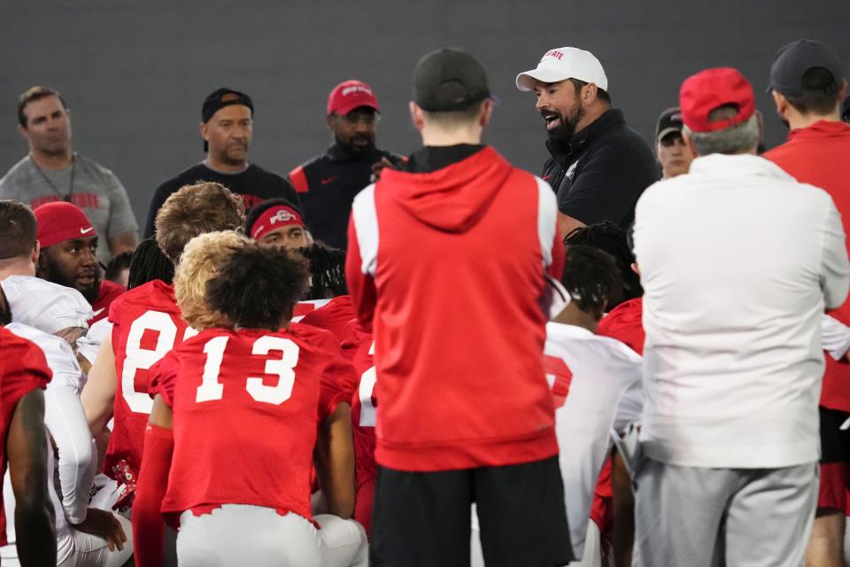 Mar 5, 2024; Columbus, OH, USA; Ohio State Buckeyes head coach Ryan Day talks to his team during the first spring practice at the Woody Hayes Athletic Center.