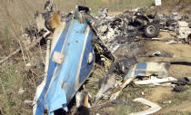 This image taken from video on Monday, Jan. 27, 2020, and provided by the National Transportation Safety Board, shows part of the wreckage of a helicopter crash near Calabasas, Calif. The Sunday, Jan. 26 crash killed former NBA basketball player Kobe Bryant, his 13-year-old daughter, Gianna, and seven others. (James Anderson/National Transportation Safety Board via AP)