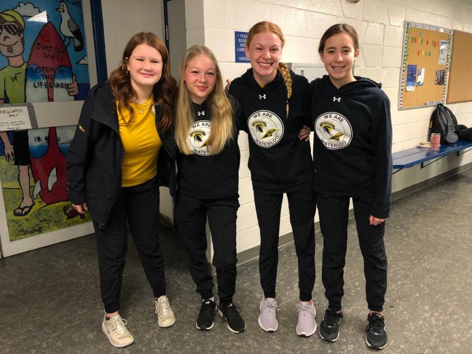 Mary Bell, Claira Hempel, Aislinn Roberts and Vivian Murphy all play minor hockey on the Waterloo Warriors girls U15 team. (Aastha Shetty/CBC - image credit)
