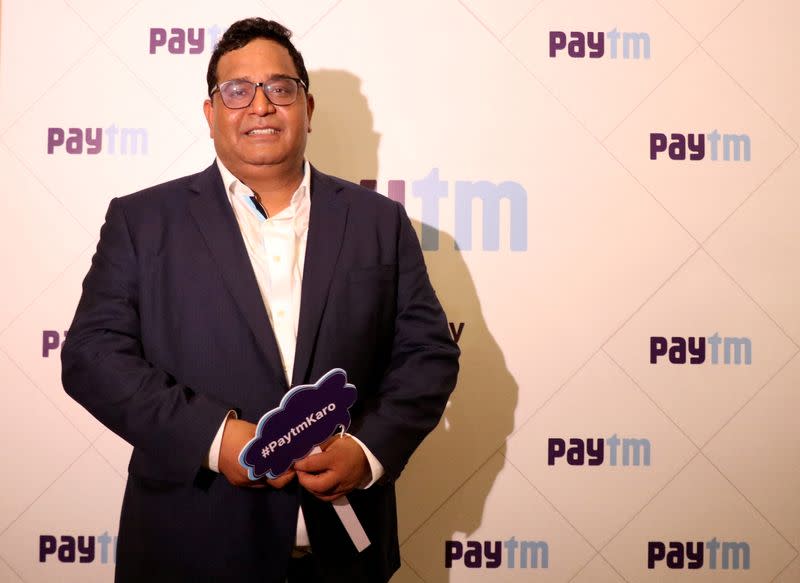 FILE PHOTO: Paytm founder and CEO Vijay Shekhar Sharma poses during his company's IPO listing ceremony at the Bombay Stock Exchange in Mumbai