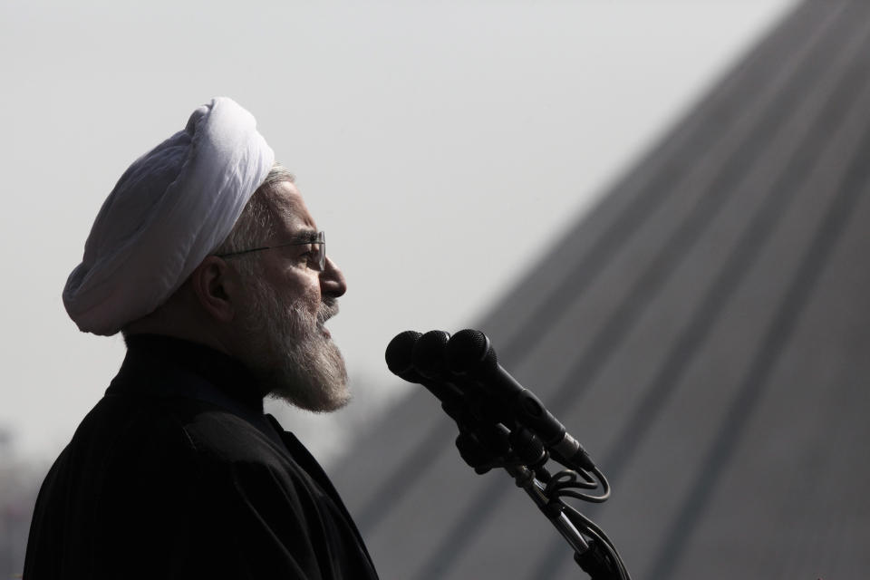 Iranian President Hassan Rouhani, delivers a speech during an annual rally commemorating anniversary of the 1979 Islamic revolution, at the Azadi 'Freedom' Square in Tehran, Iran, Tuesday, Feb. 11, 2014. Rouhani on Tuesday called for "fair and constructive" nuclear talks with world powers as the nation marked the anniversary of the 1979 Islamic revolution with massive rallies, complete with anti-American and anti-Israeli chants. Tuesday marks the 35th anniversary of the revolution that toppled the pro-U.S. Shah Mohammad Reza Pahlavi and brought Islamists to power. (AP Photo/Vahid Salemi)