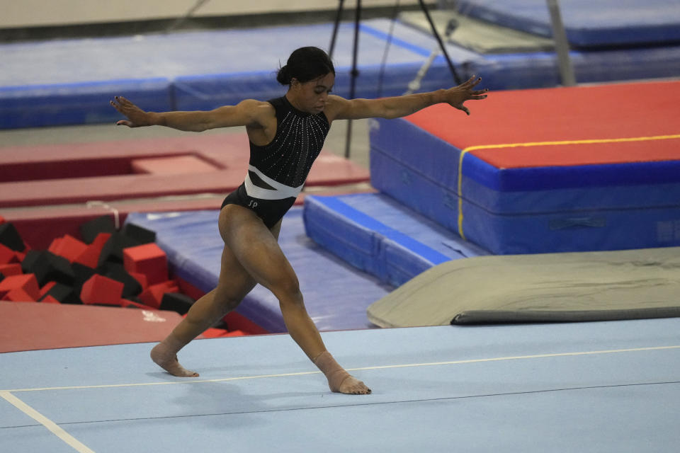 Gabby Douglas performs her floor routine while competing at the American Classic Saturday, April 27, 2024, in Katy, Texas. (AP Photo/David J. Phillip)