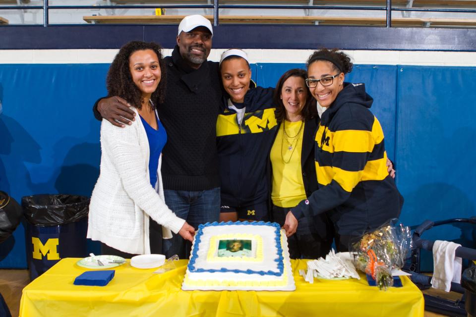 Molly Toon (center) celebrates senior day at the University of Michigan in 2013, flanked by her family (from left) sister Kirby, father Al, mother Jane and sister Sydney.