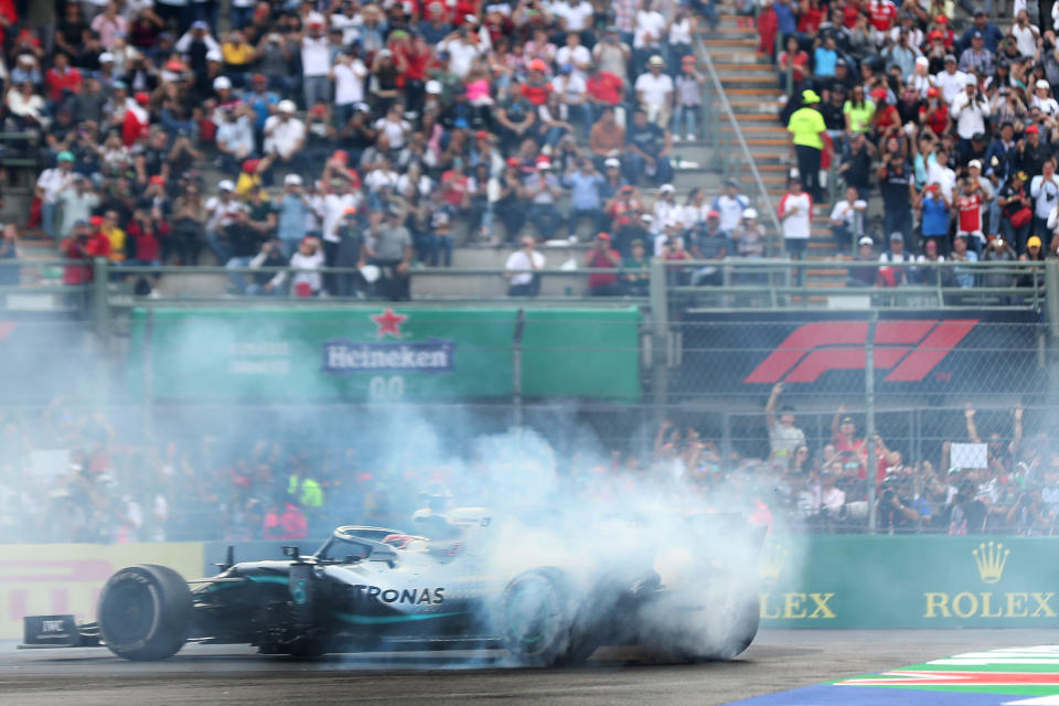 MEXICO CITY, MEXICO - OCTOBER 27: Race winner Lewis Hamilton of Great Britain and Mercedes GP celebrates in parc ferme by performing donuts during the F1 Grand Prix of Mexico at Autodromo Hermanos Rodriguez on October 27, 2019 in Mexico City, Mexico. (Photo by Mark Thompson/Getty Images)