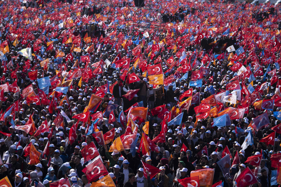 Supporters of People's Alliance's presidential candidate Recep Tayyip Erdogan attend an election rally campaign in Istanbul, Turkey, Sunday, May 7, 2023. Turkey is heading toward presidential and parliamentary elections on Sunday May 14, 2023. (AP Photo/Khalil Hamra)