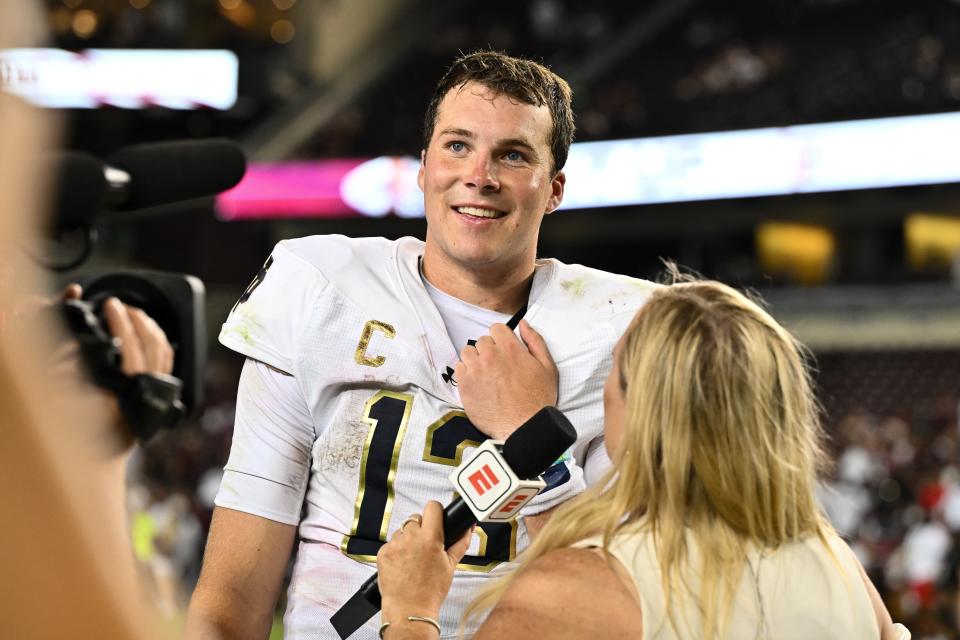 Notre Dame quarterback Riley Leonard talks with a reporter after the Irish's victory over Texas A&M last Saturday.