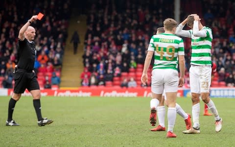 Celtic's Mikael Lustig is sent off - Credit: Jeff Holmes/PA