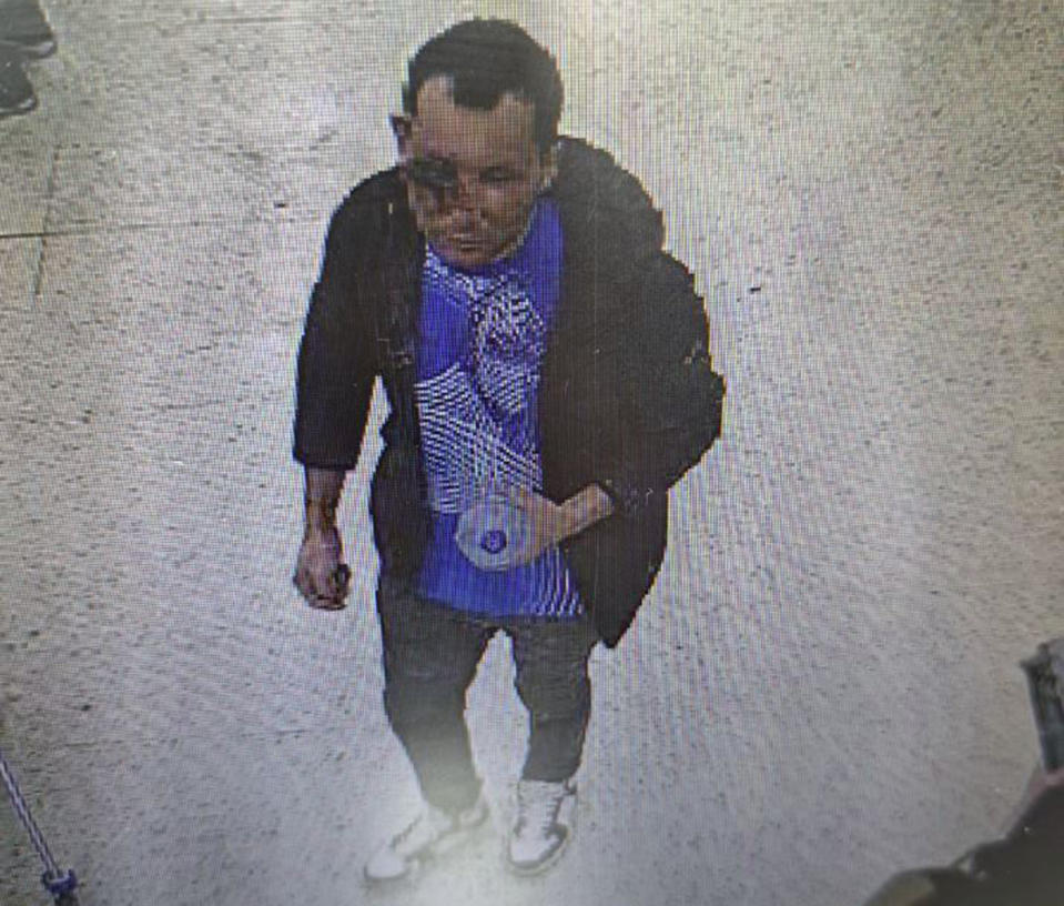 Handout CCTV image dated Jan. 31, 2024 issued by the Metropolitan Police of Abdul Ezedi, the suspect in the Clapham corrosive substance attack. A woman and her two young daughters are in a hospital being treated for injuries after a man threw a corrosive substance at them in south London. Police said a manhunt is underway to find the suspect, who they believe is known to the 31-year-old woman. (Metropolitan Police via AP)