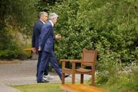 Federal Reserve Chair Jerome Powell and Governor of the Bank of England, Mark Carney chat during the three-day "Challenges for Monetary Policy" conference in Jackson Hole, Wyoming