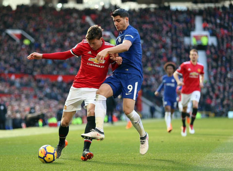 Chelsea’s Alvaro Morata (right) is held off the ball by Manchester United’s Victor Lindelof