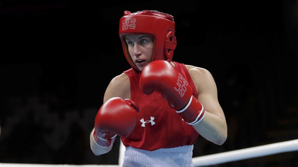 Virginia Fuchs of United States competes against Irismar Cardozo of Venezuela during the first round of their women's fly, 51 kg, boxing semifinal match at the Pan American Games in Lima, Peru, Tuesday, July 30, 2019. (AP Photo/Fernando Llano)