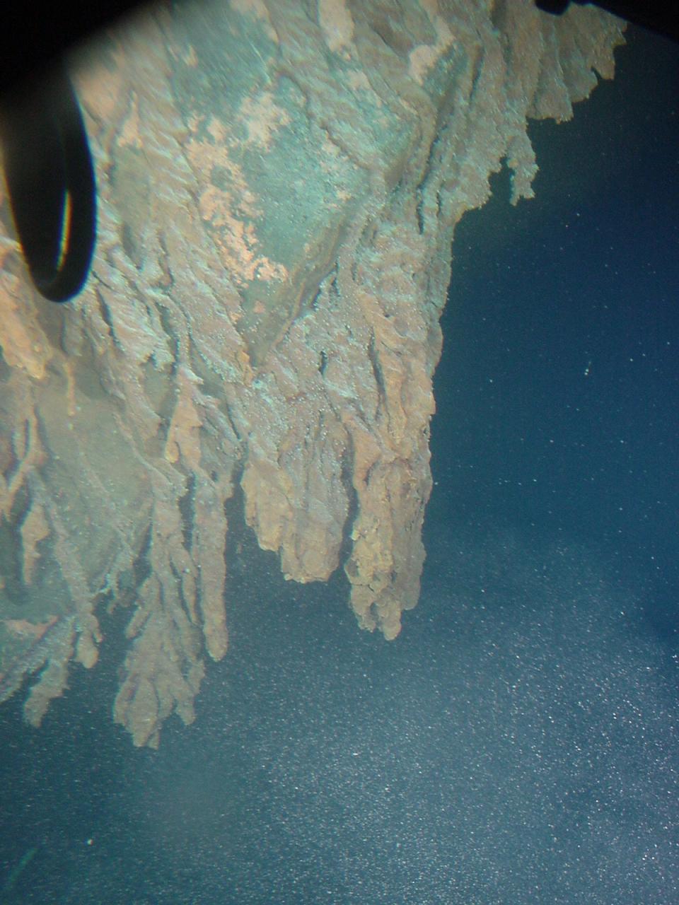 Rusticles growing down from the stern section of Titanic (NOAA)