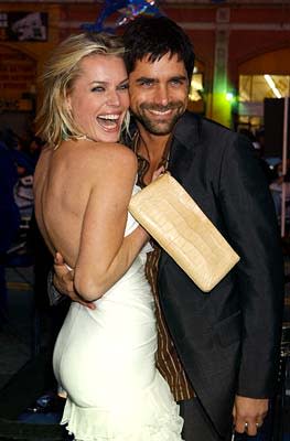 Rebecca Romijn Stamos and John Stamos at the Hollywood premiere of 20th Century Fox's X2: X-Men United