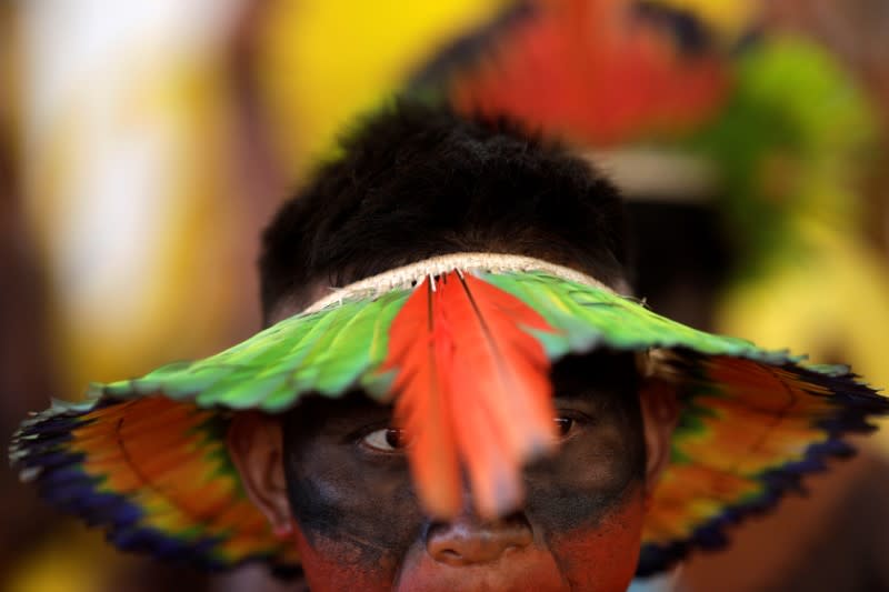 An Indigenous man of Kayapo tribe, attends a four-day pow wow in Piaracu village, in Xingu Indigenous Park, near Sao Jose do Xingu, Mato Grosso state