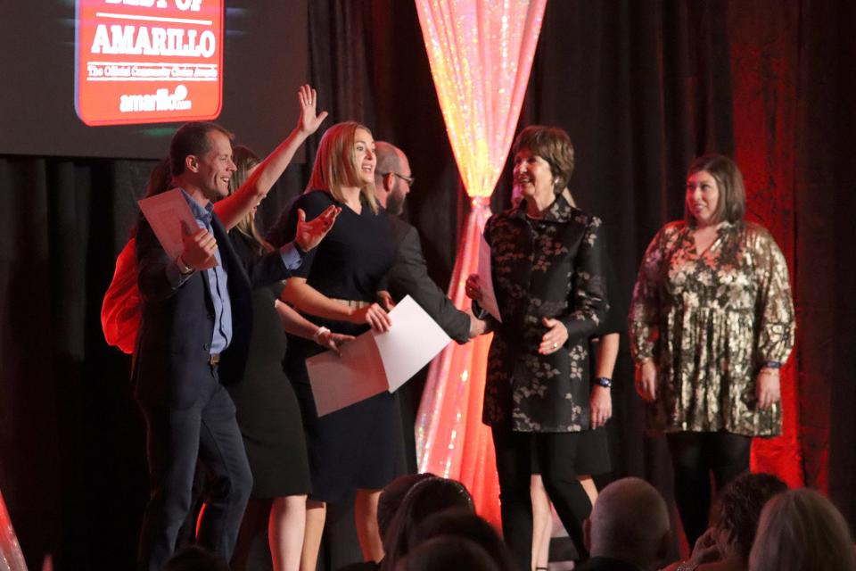 Representatives from Amarillo National Bank celebrate during the 2022 Best of Amarillo ceremony Friday night at the Amarillo Civic Center.