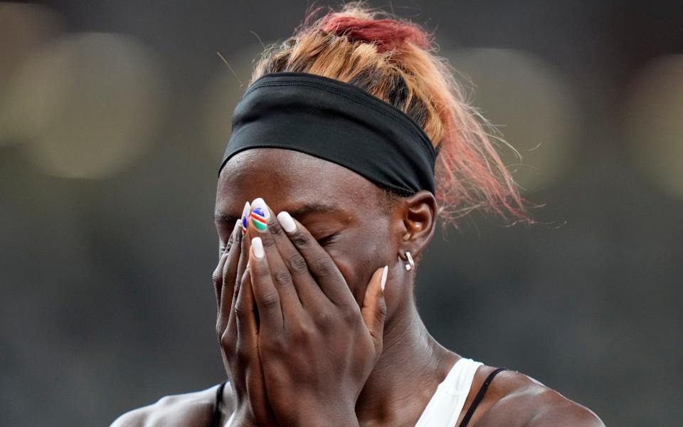  Beatrice Masilingi, of Namibia, reacts after a semifinal of the women's 200-meters at the 2020 Summer Olympics - AP