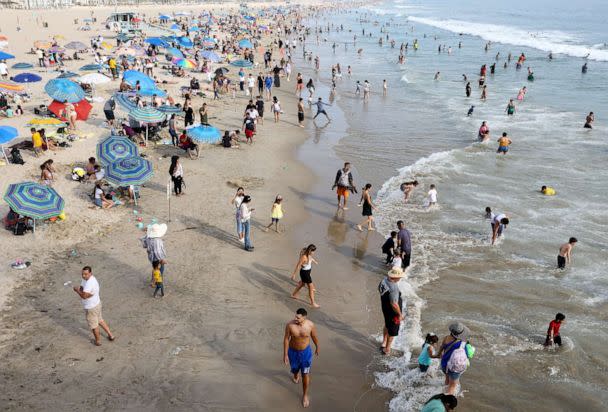 PHOTO: People gather along Santa Monica beach amid an intense heat wave in Southern California, on Sept. 4, 2022, in Santa Monica, Calif. (Mario Tama/Getty Images)