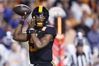 Tennessee quarterback Hendon Hooker prepares to throw to a receiver during the first half of an NCAA college football game against Kentucky, Saturday, Oct. 29, 2022, in Knoxville, Tenn. (AP Photo/Wade Payne)