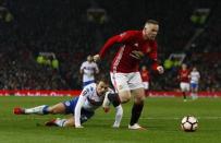 Britain Football Soccer - Manchester United v Wigan Athletic - FA Cup Fourth Round - Old Trafford - 29/1/17 Manchester United's Wayne Rooney in action Action Images via Reuters / Jason Cairnduff Livepic EDITORIAL USE ONLY. No use with unauthorized audio, video, data, fixture lists, club/league logos or "live" services. Online in-match use limited to 45 images, no video emulation. No use in betting, games or single club/league/player publications. Please contact your account representative for further details.