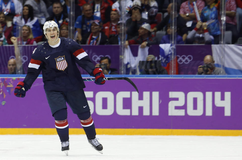 USA forward T.J. Oshie reacts after scoring the winning goal in a shootout against Russia during overtime of a men's ice hockey game at the 2014 Winter Olympics, Saturday, Feb. 15, 2014, in Sochi, Russia. (AP Photo/Mark Humphrey)