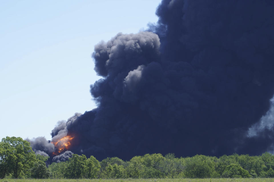 Flames and smoke are seen from an explosion at a chemical plant in Rockton, Ill., Monday, June 14, 2021. (Stacey Wescott/Chicago Tribune via AP)